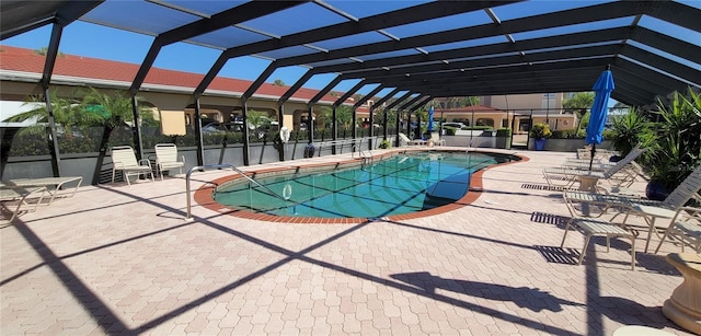 view of pool featuring a lanai and a patio area