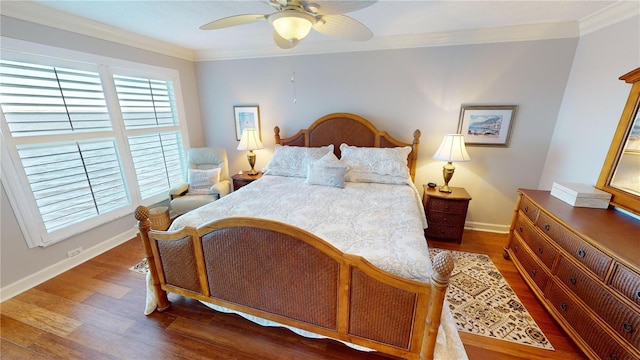 1 Colony Point Dr Unit 16C, Punta Gorda, FL 33950 - bedroom with wood finished floors, crown molding, baseboards, and ceiling fan