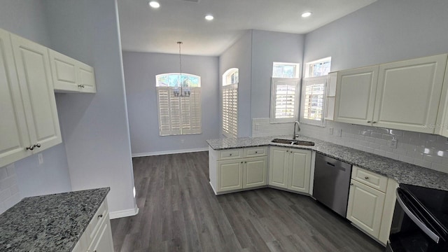 kitchen featuring sink, stainless steel dishwasher, decorative light fixtures, dark hardwood / wood-style flooring, and white cabinetry