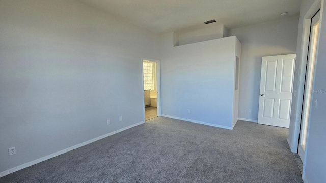 spare room with carpet flooring