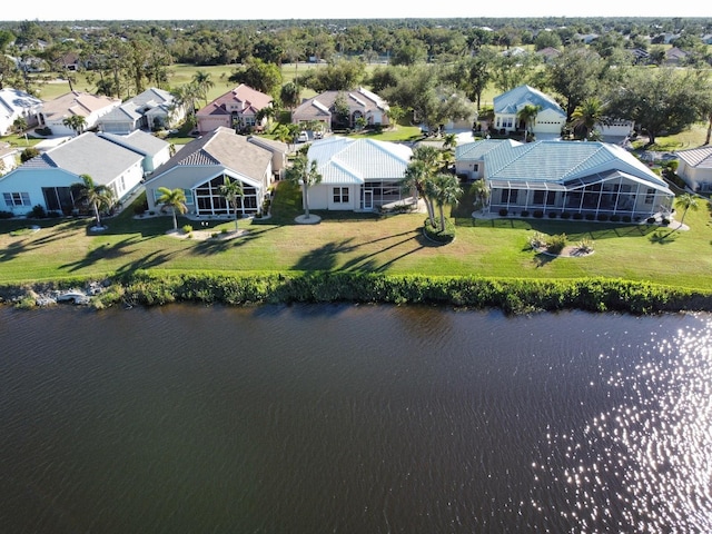 bird's eye view with a water view