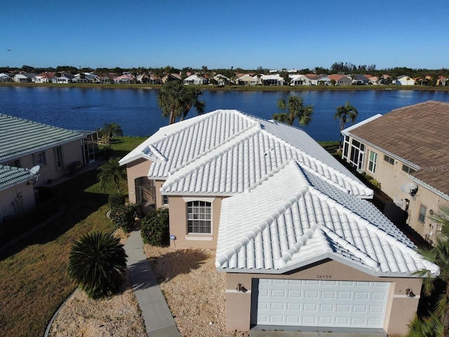 bird's eye view with a water view