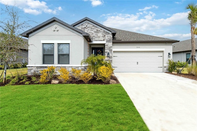 view of front of property featuring a garage and a front lawn