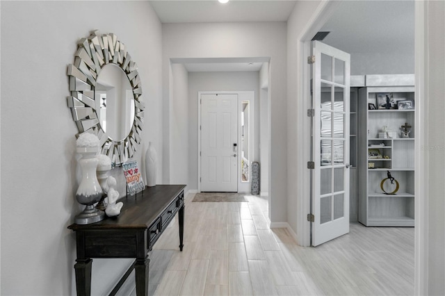 entrance foyer with hardwood / wood-style flooring