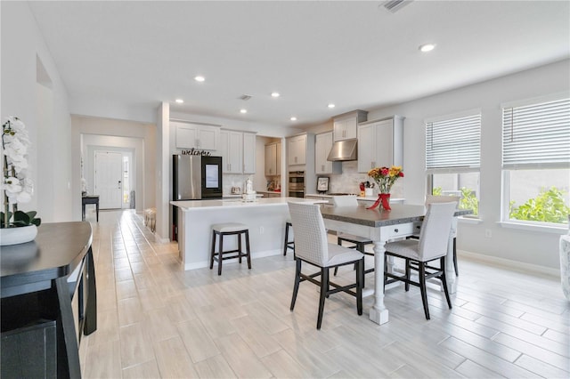 dining room featuring light hardwood / wood-style floors