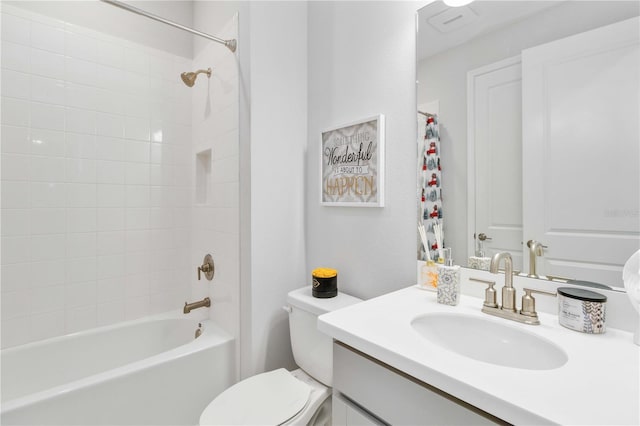 full bathroom featuring shower / tub combo, vanity, and toilet