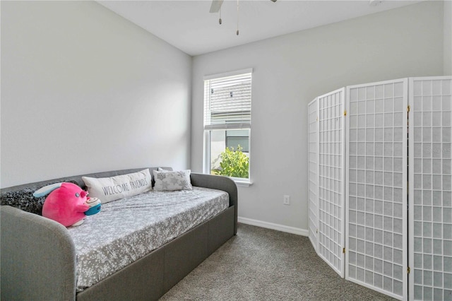 bedroom featuring ceiling fan and carpet floors