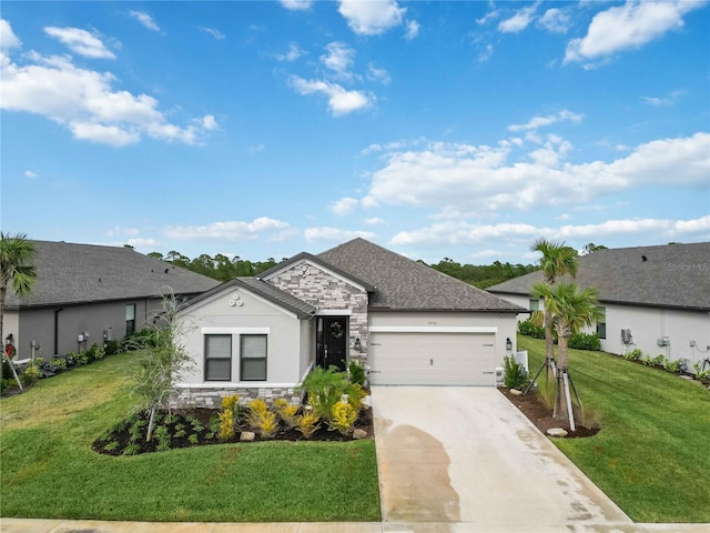 ranch-style house featuring a garage and a front yard