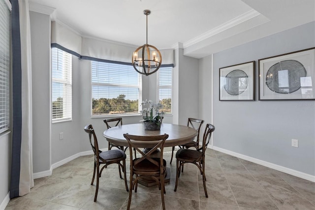 dining area featuring crown molding and a notable chandelier