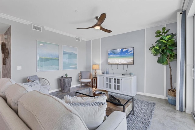 living room featuring ceiling fan, ornamental molding, and light tile patterned floors