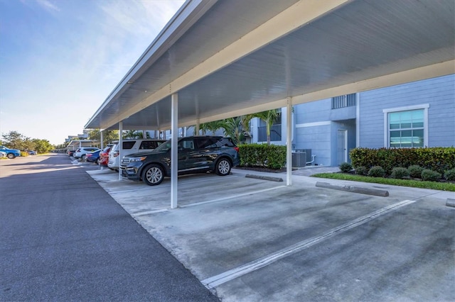 view of vehicle parking featuring a carport