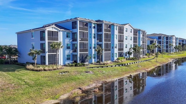 view of building exterior with a water view