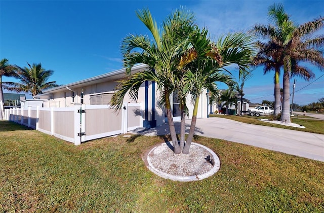 view of home's exterior featuring a yard