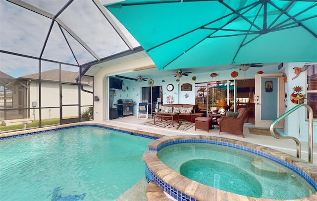 view of pool with a lanai, ceiling fan, a patio, and an outdoor hangout area