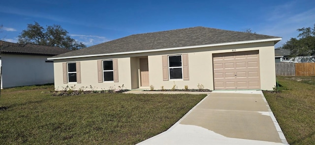 ranch-style house with a garage and a front lawn