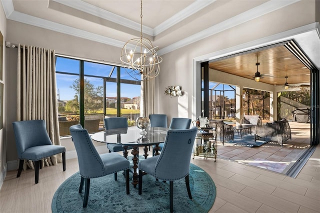 dining area featuring ceiling fan with notable chandelier, wooden ceiling, a raised ceiling, and ornamental molding