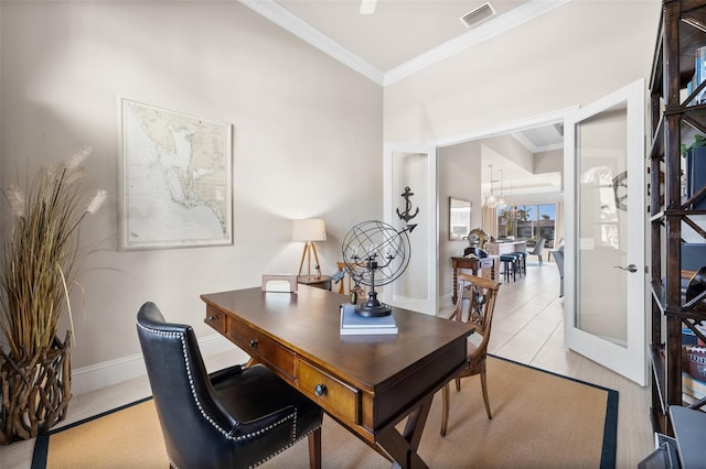 office with french doors, light hardwood / wood-style floors, crown molding, and a notable chandelier