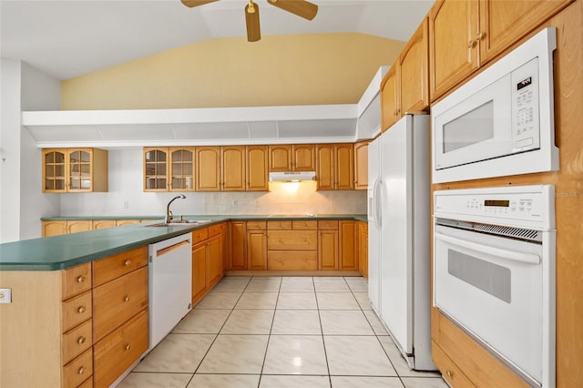 kitchen featuring white appliances, vaulted ceiling, ceiling fan, sink, and light tile patterned floors