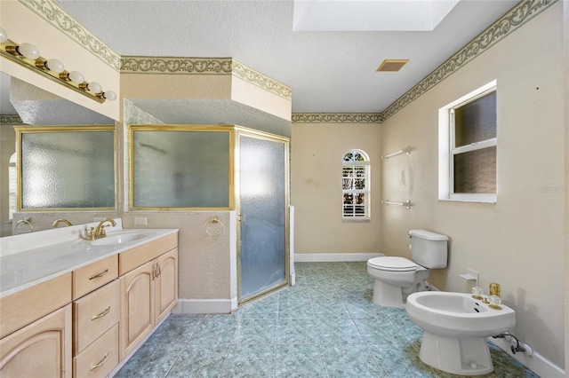 bathroom featuring vanity, a bidet, an enclosed shower, and toilet