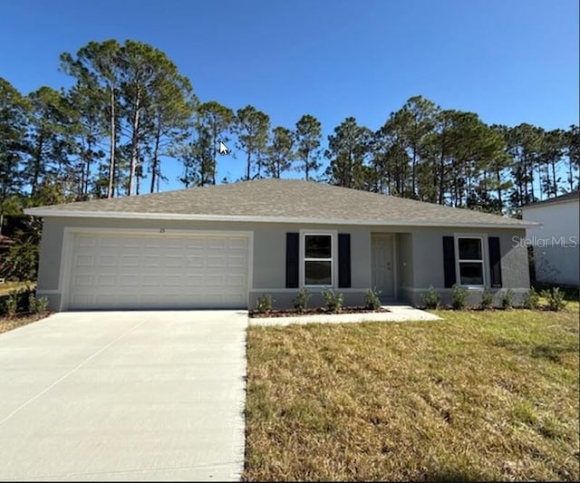 ranch-style home with a front yard and a garage