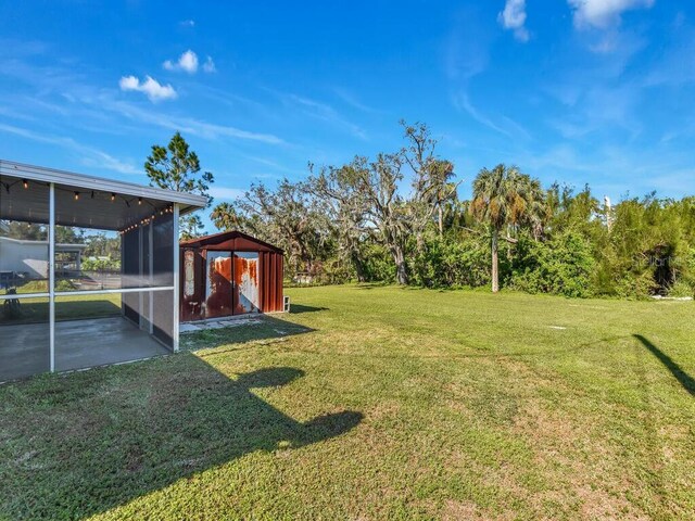 view of yard featuring a sunroom