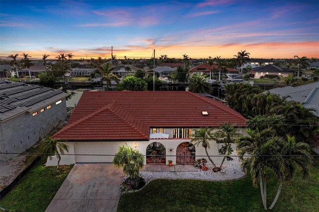 aerial view at dusk with a residential view