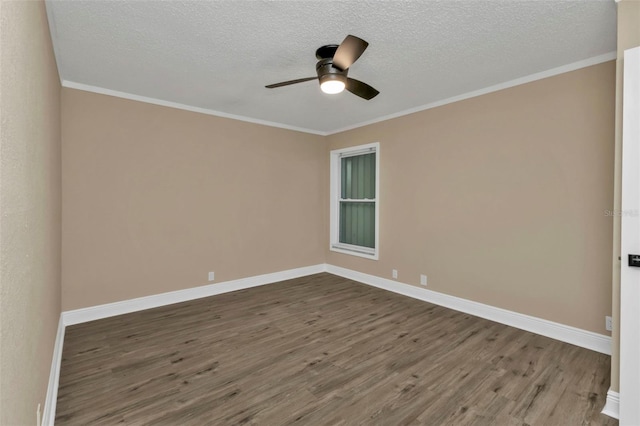 spare room with crown molding, hardwood / wood-style floors, a textured ceiling, and ceiling fan