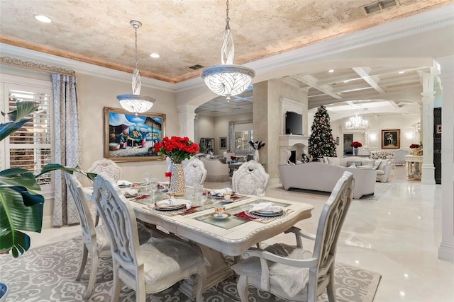 dining space featuring ornate columns, coffered ceiling, crown molding, beam ceiling, and a chandelier