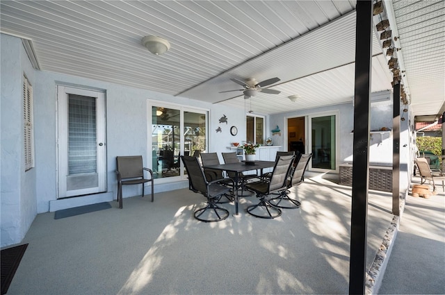 view of patio featuring ceiling fan