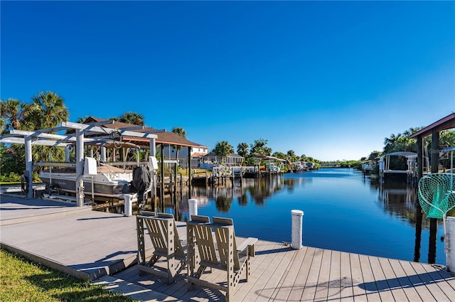 dock area featuring a water view