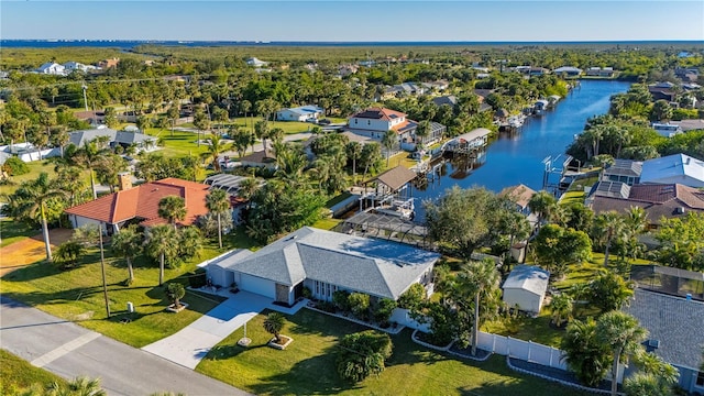 drone / aerial view featuring a water view