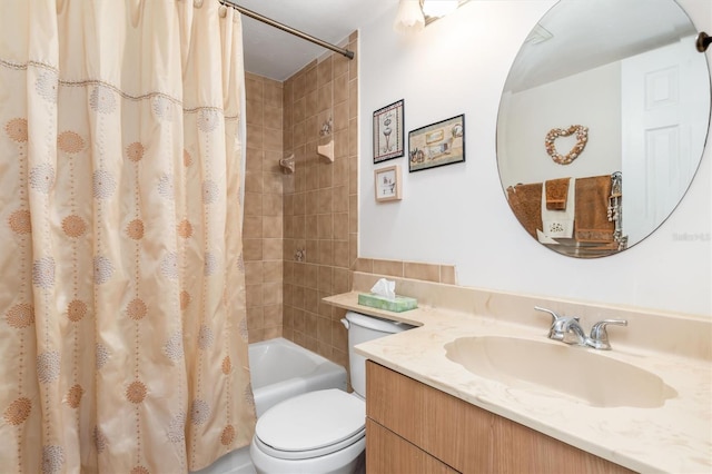 full bathroom featuring vanity, toilet, and shower / bath combo with shower curtain