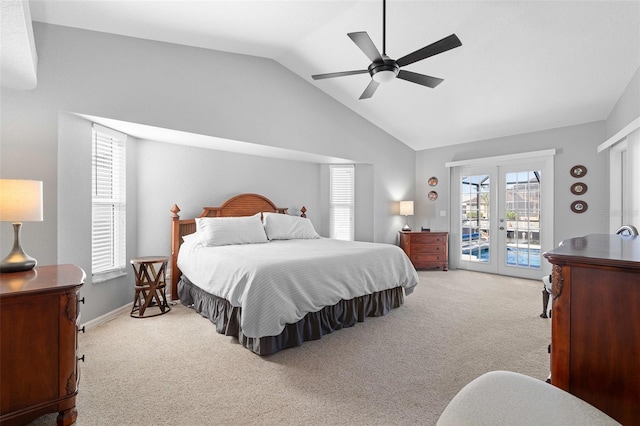 carpeted bedroom featuring ceiling fan, french doors, access to outside, and vaulted ceiling