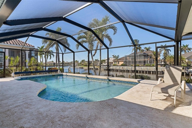 view of swimming pool with a lanai, a water view, and a patio