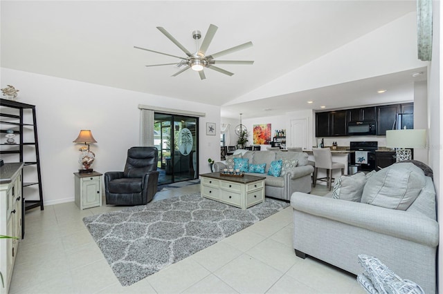 tiled living room featuring ceiling fan and lofted ceiling