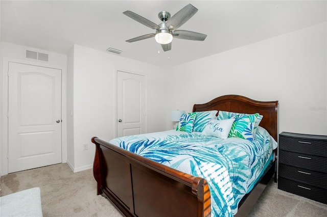 carpeted bedroom with ceiling fan