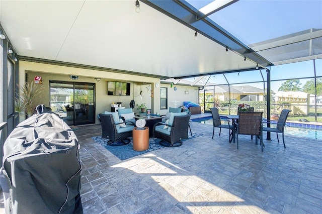 view of patio with an outdoor hangout area and a lanai