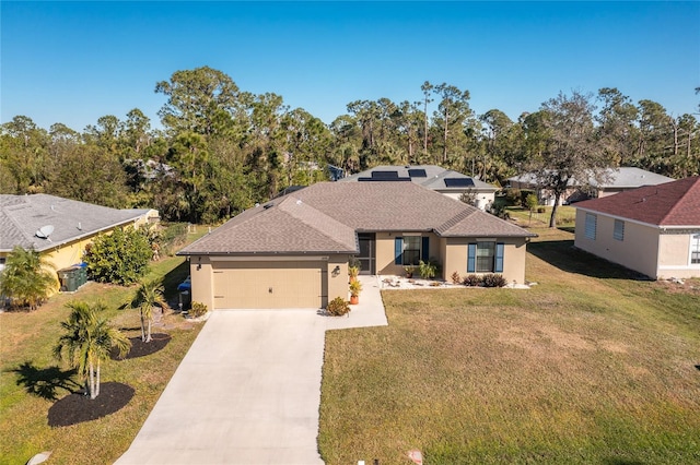 ranch-style home featuring a garage and a front lawn