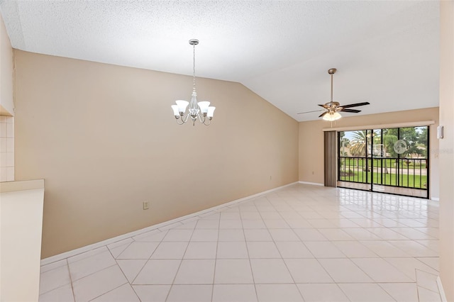 tiled spare room with a textured ceiling, ceiling fan with notable chandelier, and lofted ceiling