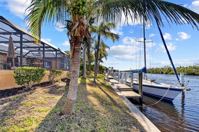 dock area featuring a lanai and a water view