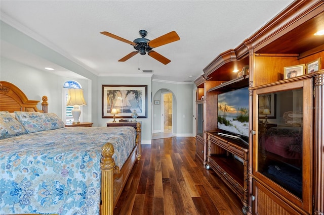 bedroom with ceiling fan, dark hardwood / wood-style flooring, and ornamental molding