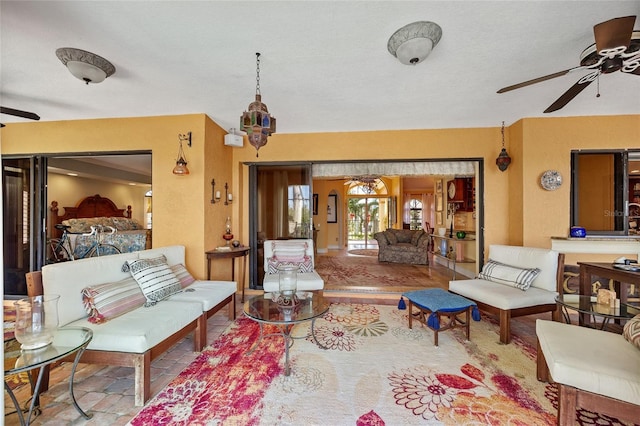 living room featuring ceiling fan