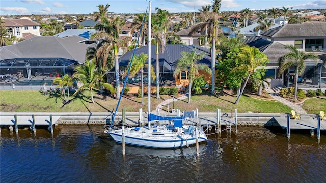 dock area with a water view and a lanai