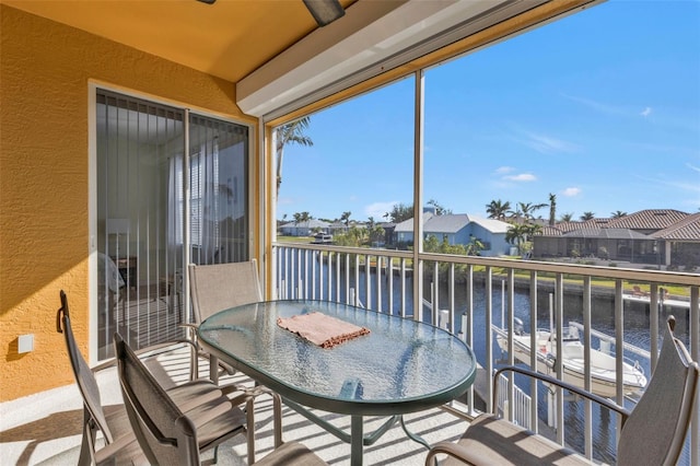 sunroom with a water view