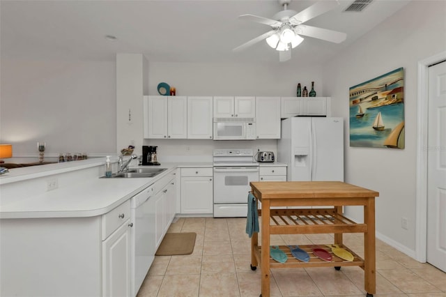 kitchen featuring white cabinets, white appliances, and sink