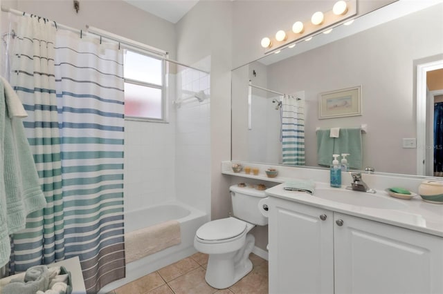 full bathroom with tile patterned floors, vanity, toilet, and shower / bath combo with shower curtain