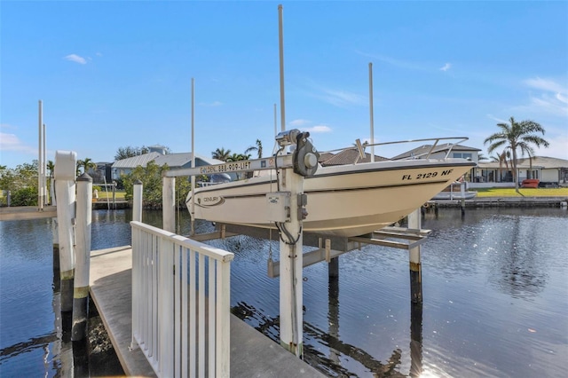 dock area featuring a water view