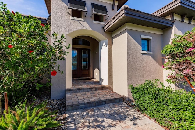 doorway to property featuring french doors