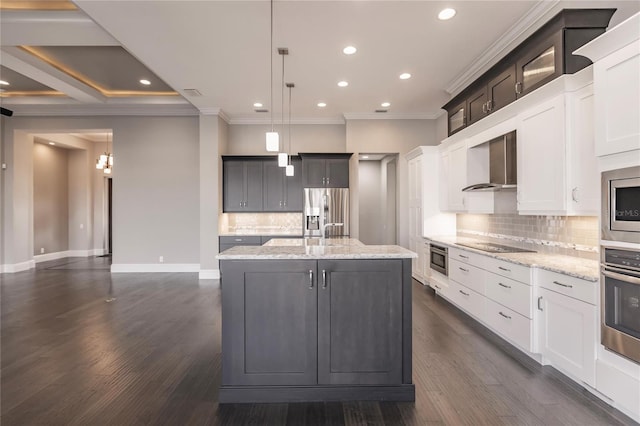 kitchen featuring a center island with sink, hanging light fixtures, wall chimney exhaust hood, dark hardwood / wood-style floors, and stainless steel appliances