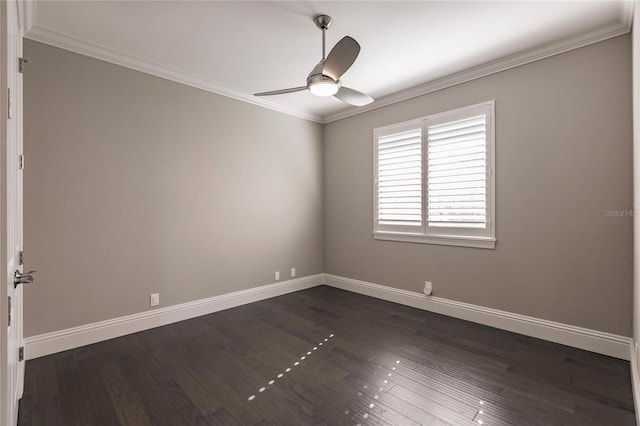 empty room featuring ceiling fan, dark hardwood / wood-style floors, and ornamental molding